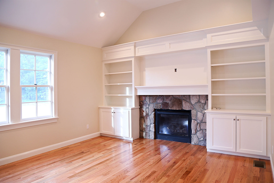 built in bookcase and fireplace